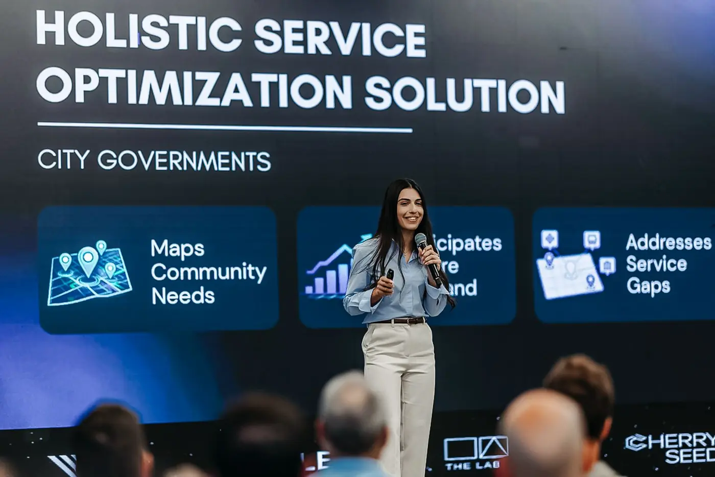 A Cherry Seed founder presenting a startup solution for city governments.